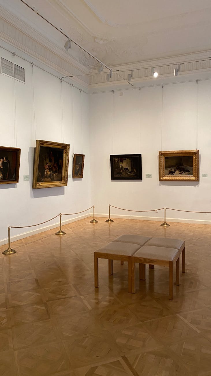 Gallery director arranging exhibition space