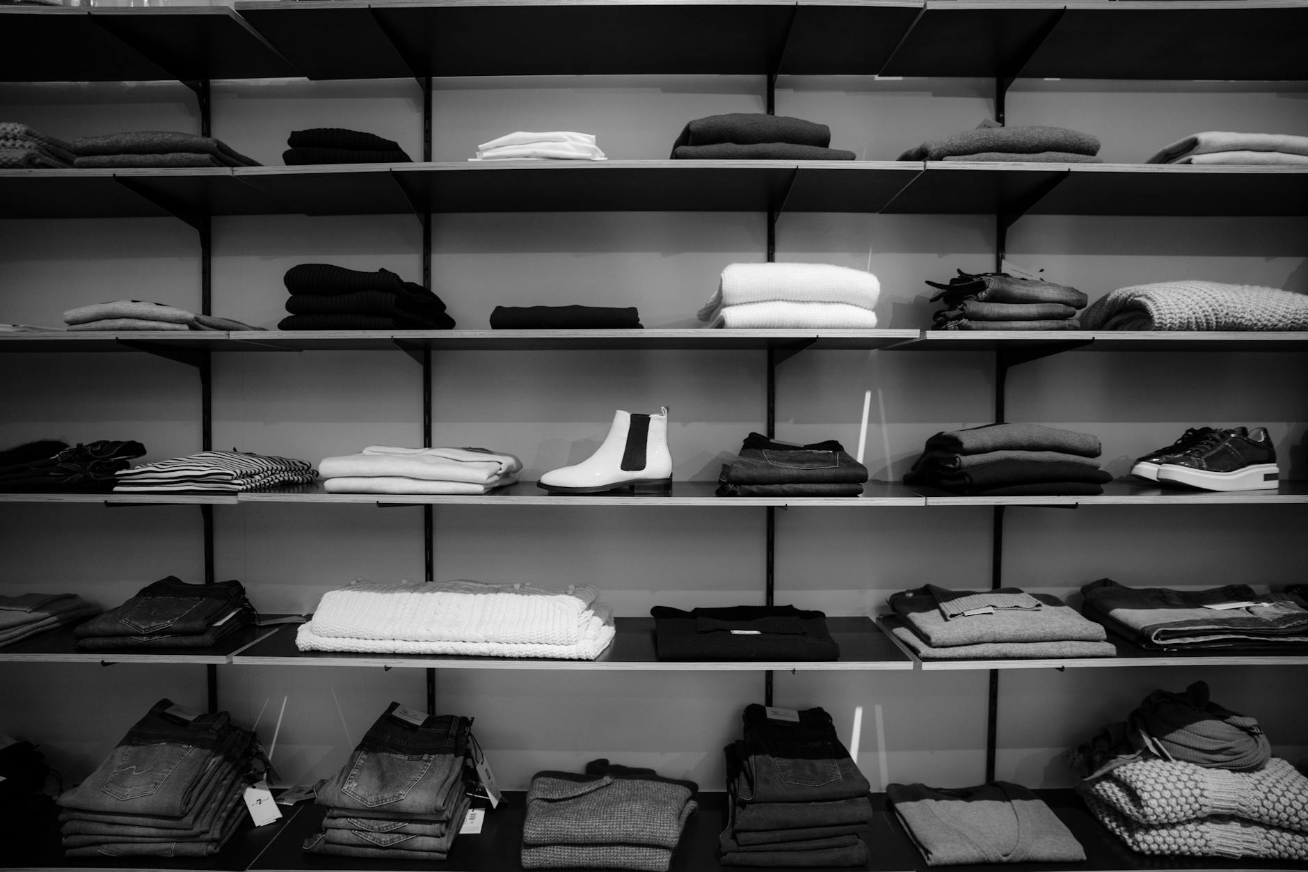 Linen clothing collection on wooden hangers