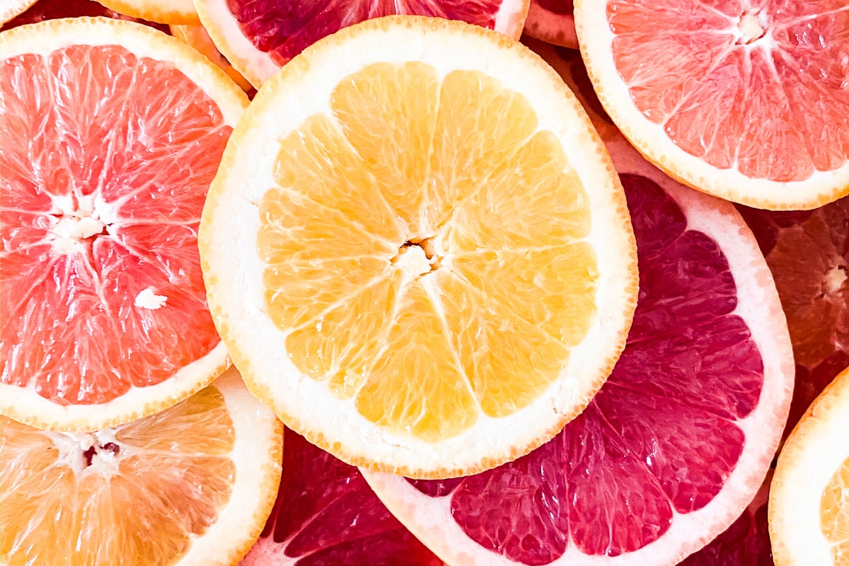 Vibrant citrus fruit cross-sections in a colorful arrangement