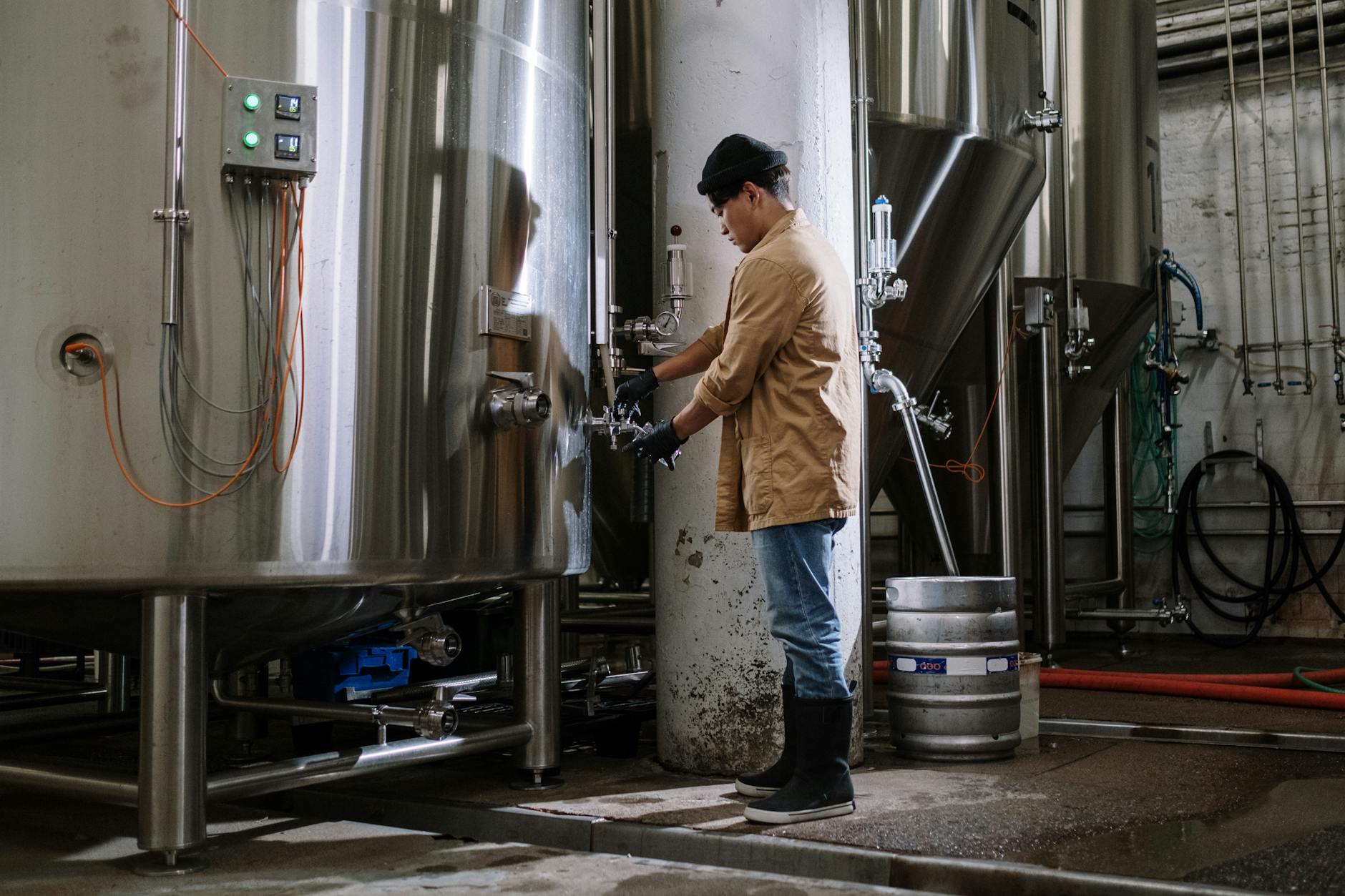Fresh craft beer being poured into glass
