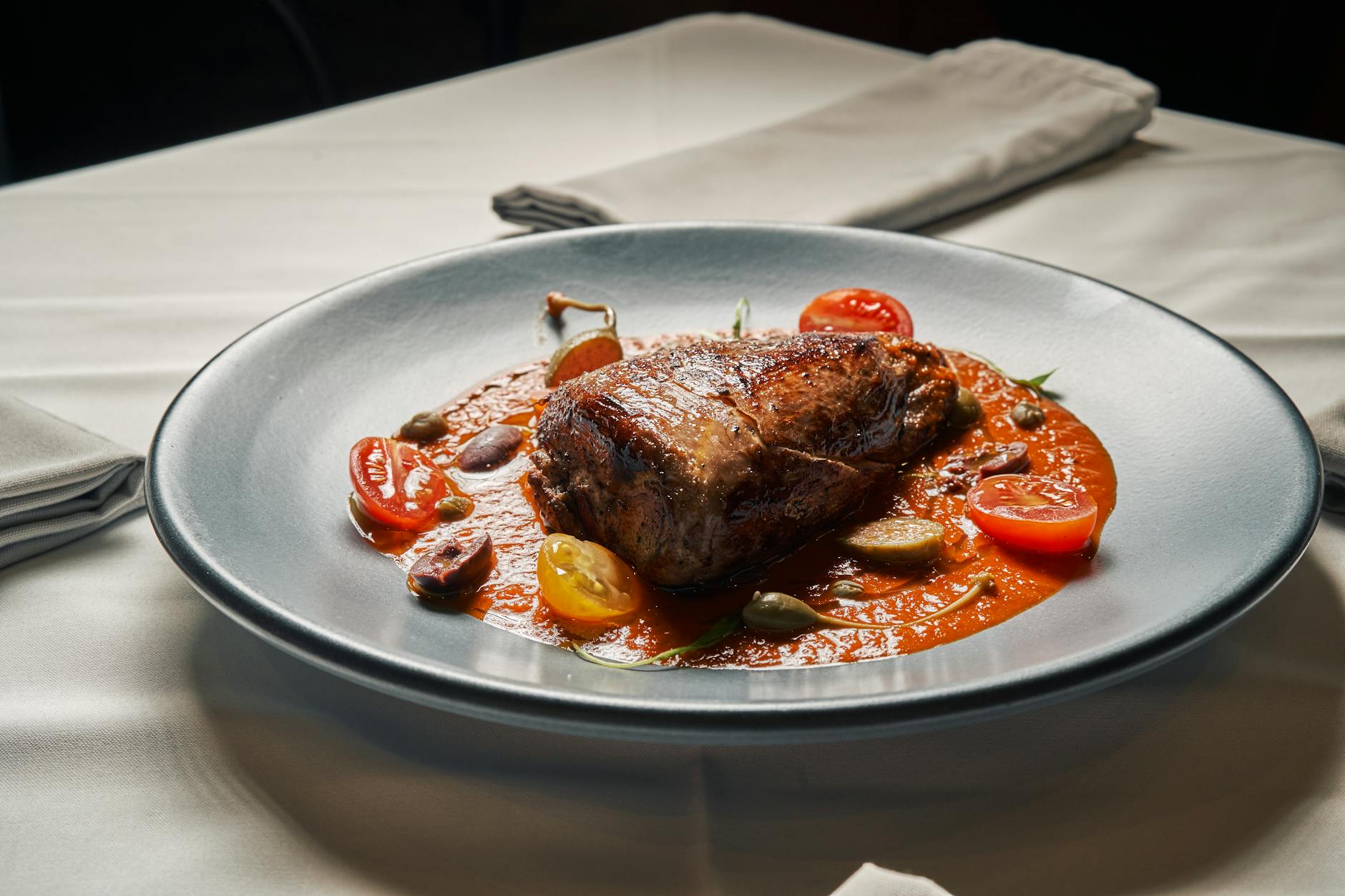 Artfully plated seasonal entrée at The Meridian Table