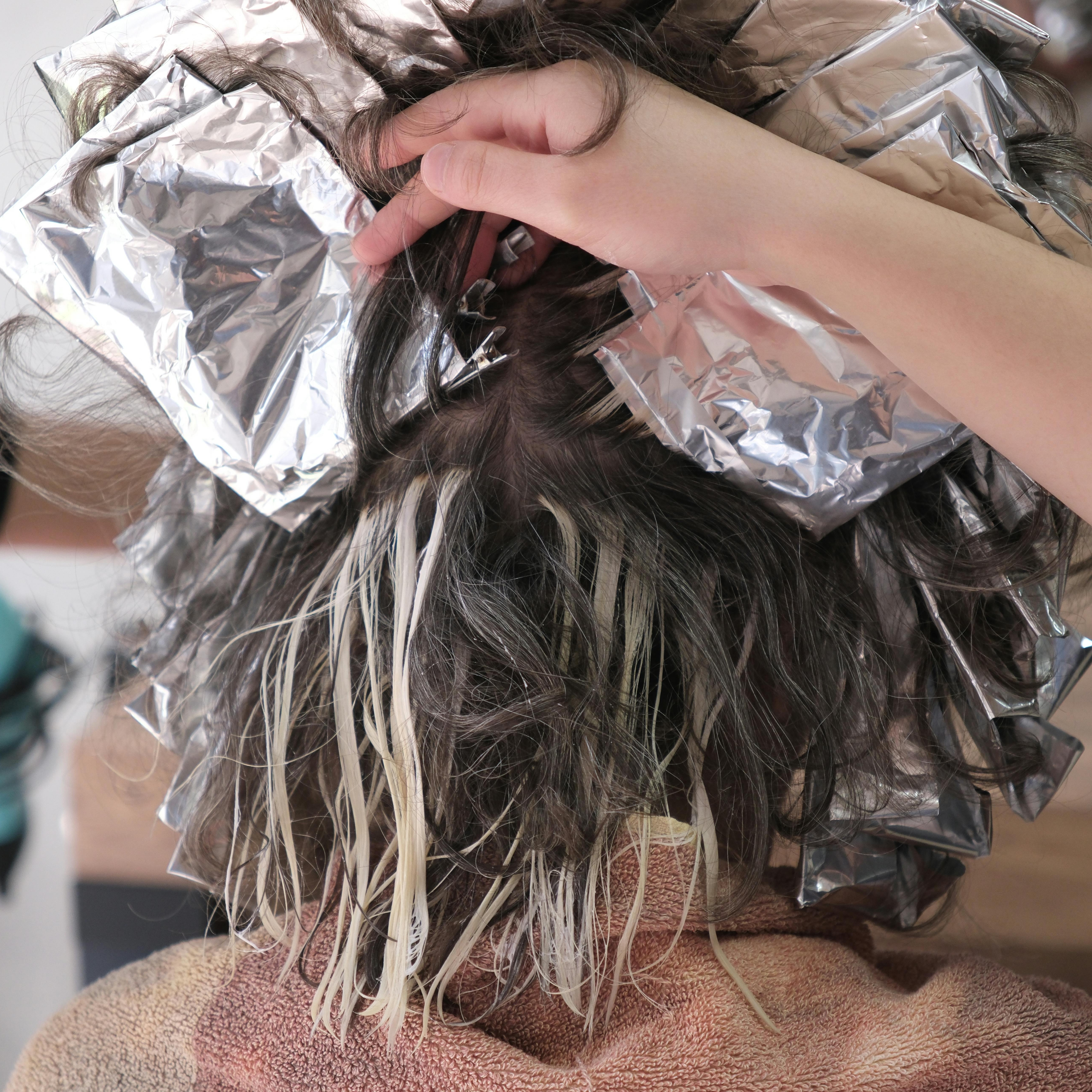 Stylist delivering a precision haircut